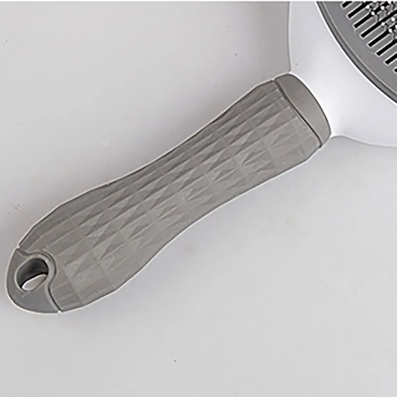 De-shedding Grooming Brush for Dogs & Cats.